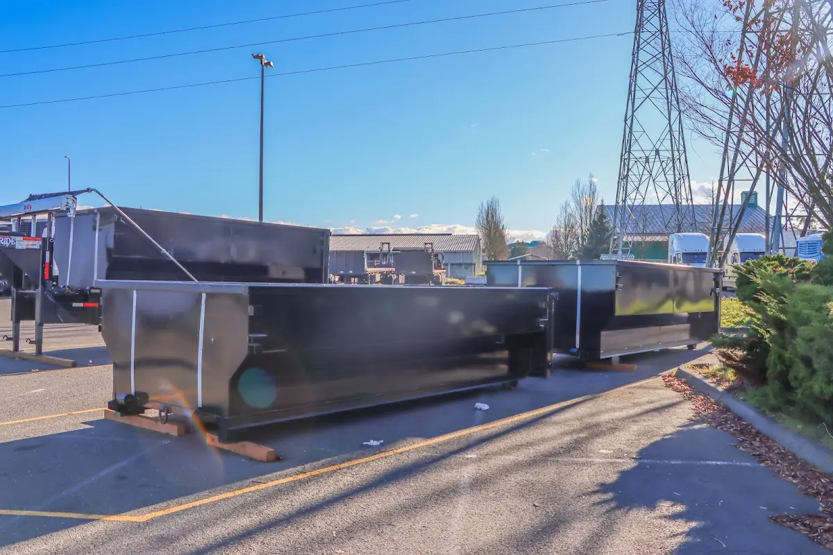 Roll-off dumpster ready for waste disposal at job site for Concrete Dumpster Rental in Alexandria